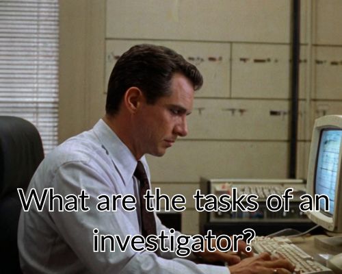The investigator sits in silence, deep in thought.